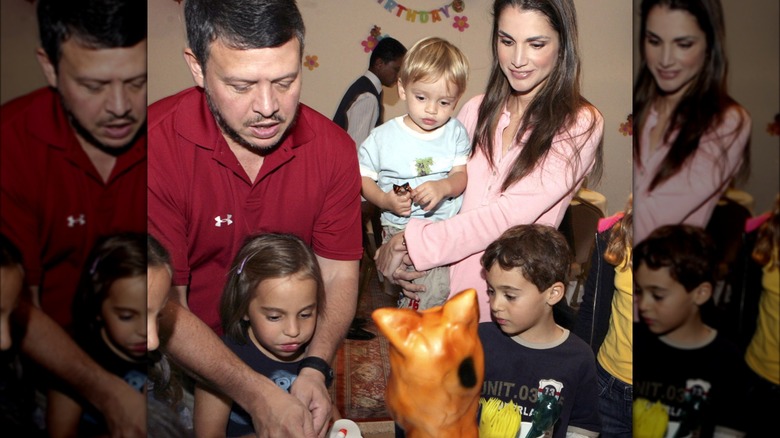 Queen Rania with her husband and children