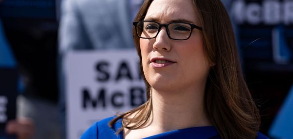 Sarah McBride speaking at a rally.