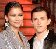 Zendaya and Tom Holland pose at a photocall for 'Spider-Man: No Way Home'.