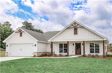 Main exterior photo of Plan #142-1271: A charming Ranch-style home with a covered front porch, forward-facing gables, and natural wood timber trim. 