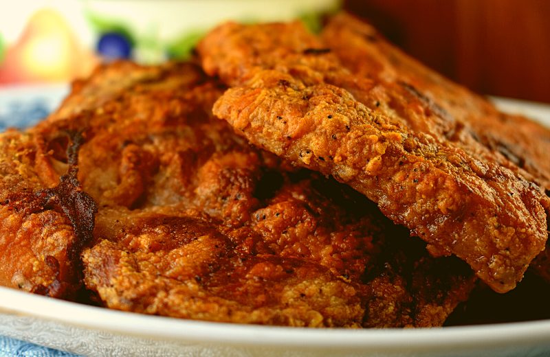 Fried Pork Chops is a old fashioned recipe using just flour; there's no egg or breadcrumbs needed.  Follow these easy instructions for how to make fried pork chops like grandma used to make.