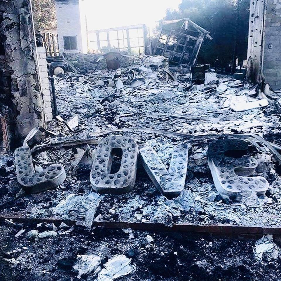  'Love' was all that remained of Liam Hemsworth and Miley Cyrus's house after the fire