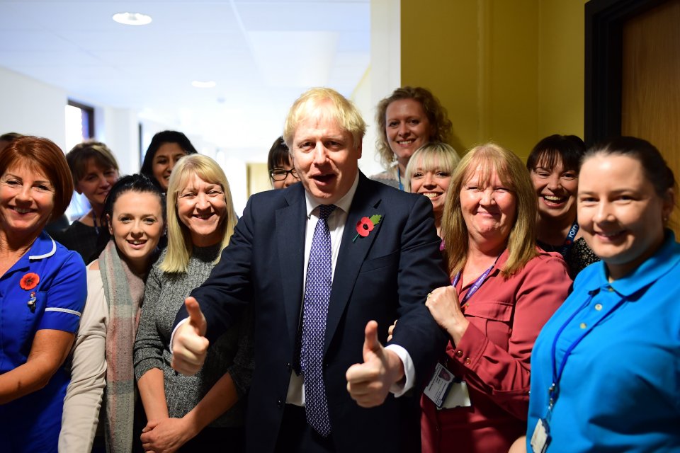  Boris Johnson gives two thumbs up as he meets medical stuff at a hospital in the East Midlands