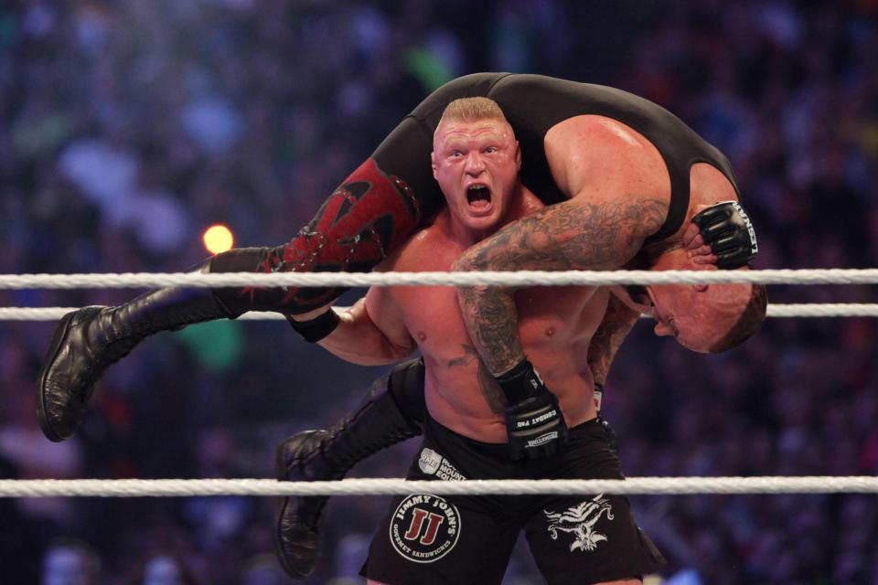  Lesnar broke Undertaker's legendary WrestleMania streak