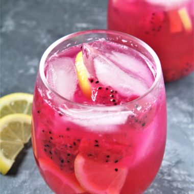 Featuring bold tropical flavors, this Starbucks Copycat Mango Dragonfruit Lemonade Refresher is a refreshing drink that you can make at home and enjoy all year round!