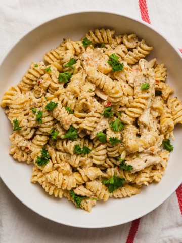 a bowl of garlic parmesan chicken pasta