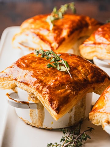 Ground beef pot pie on a plate.