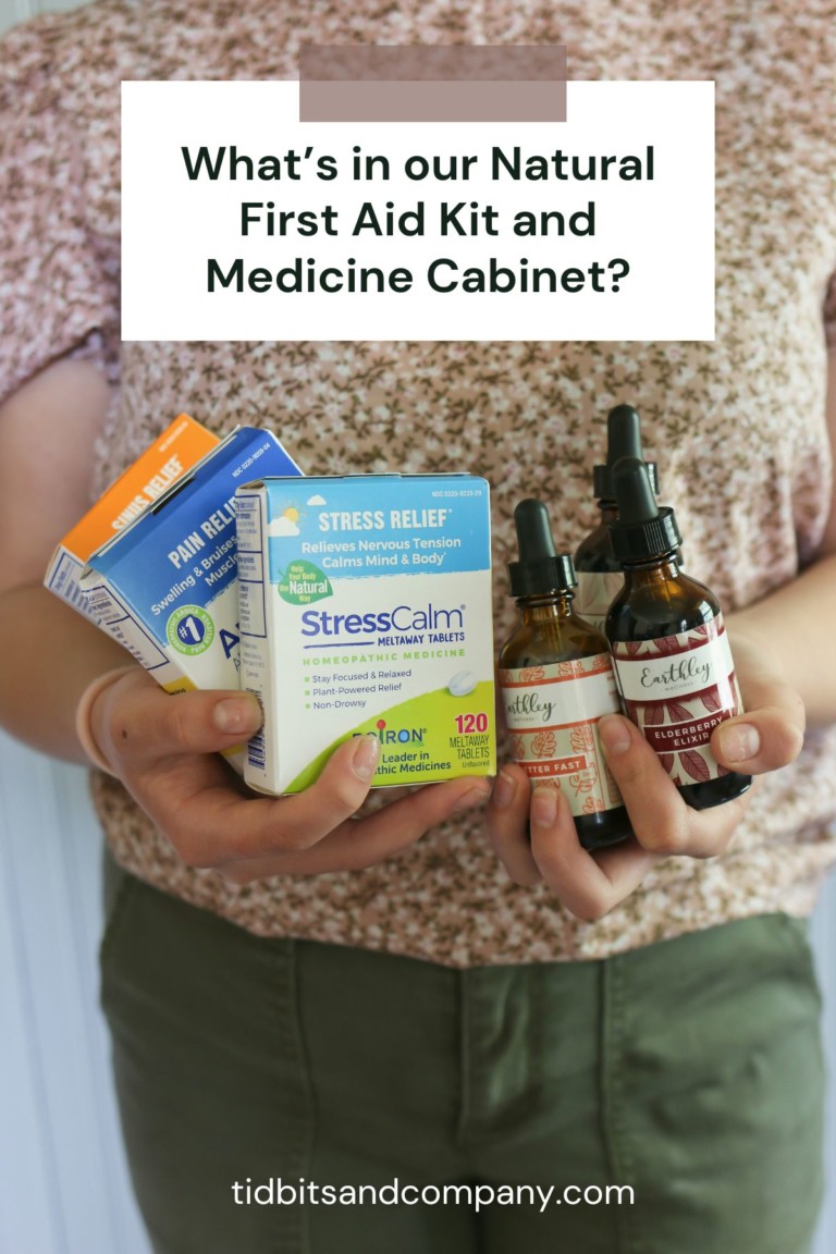 A girl holds various natural remedies and medicines in her hands