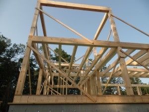 second floor framework on post and beam home, rear of home, post and beam homes, under construction, Timberhaven Log Homes, log home, log cabin, log cabins, laminated, kiln dried 