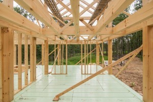 beam pocket in conventionally framed wall, post and beam home under construction, Timberhaven, log home, log homes, log cabin, laminated, kiln dried