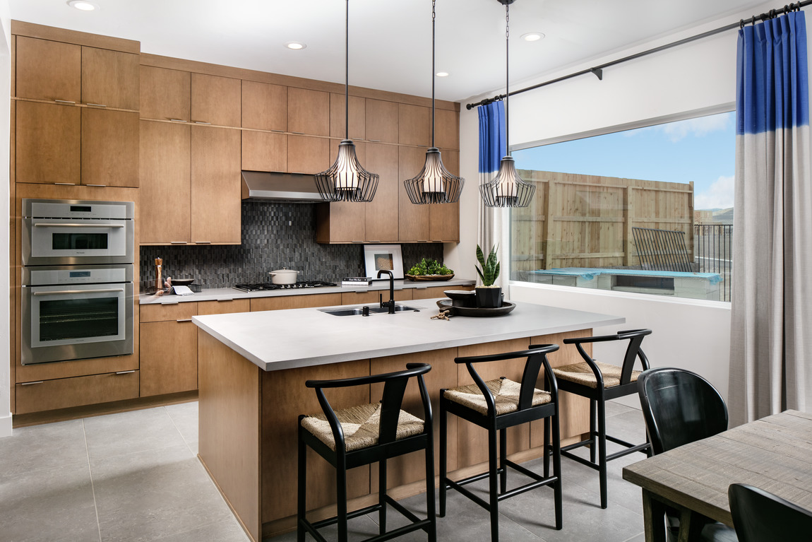 Modern kitchen with natural lighting and a nordic design aesthetic. 