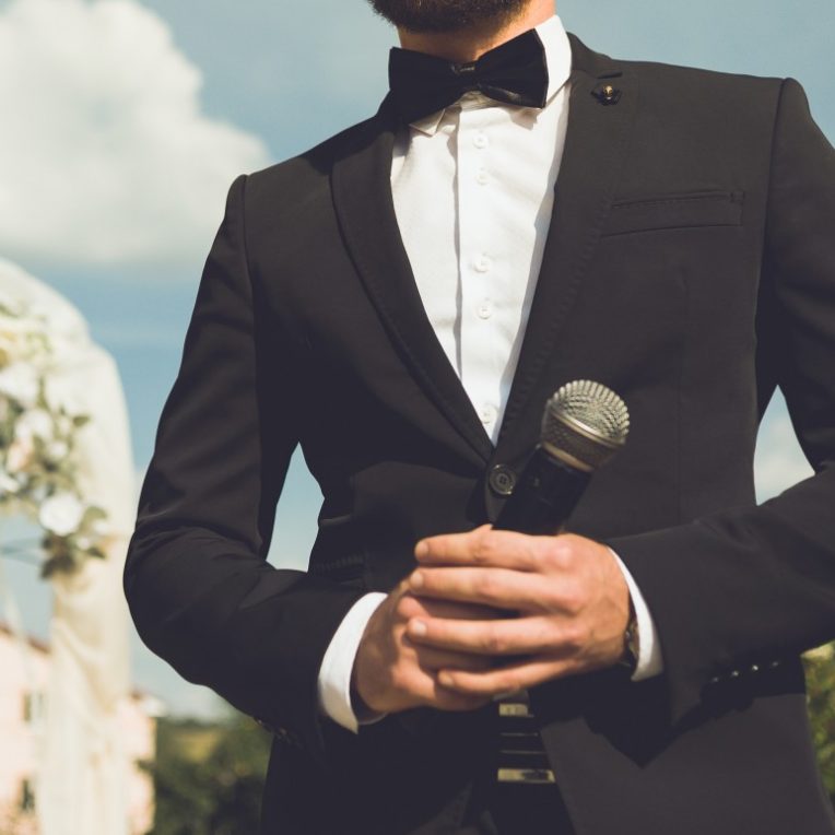 Groom getting ready to give speech