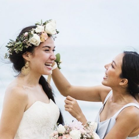 Cheerful bride at the beach