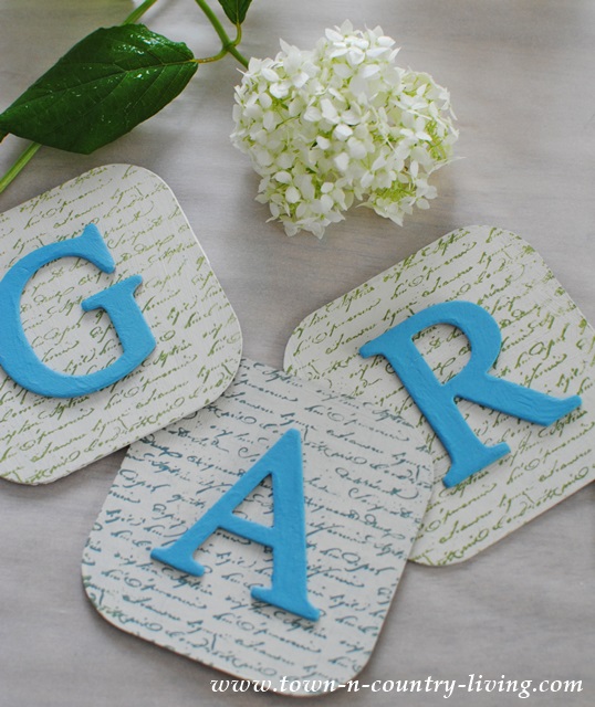 DIY Garden banner made from chipboard squares