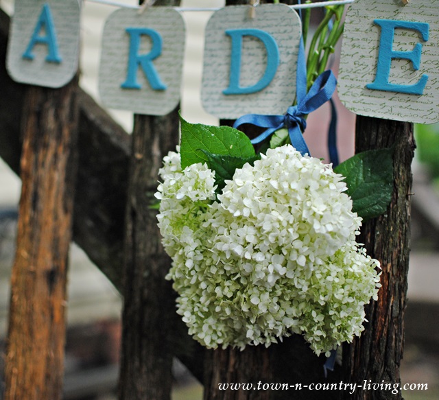 Rustic Picket Fence with Simple Garden Banner