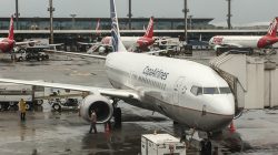 a large white airplane at an airport