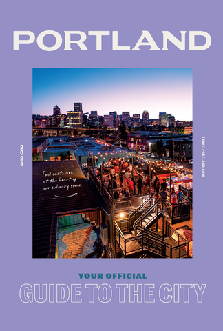 an image of Portland surrounded by a purple frame and the words "Portland your official guide to the city"