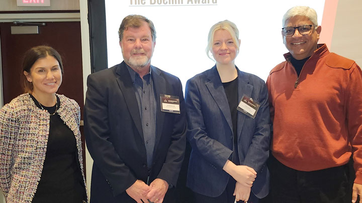 Casey Eaton of The University of Alabama in Huntsville (second from right) posed with SERC Director of Operations Kara Pepe, CTO Tom McDermott and Executive Director Dinesh Verma.