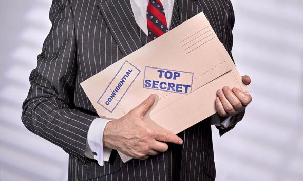 Guilty pleasures header image, man with top secret folder