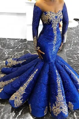 unique gold lace adorned blue glitter trumpet prom gown