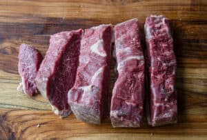 Slicing a Picanha into 2 inch slices