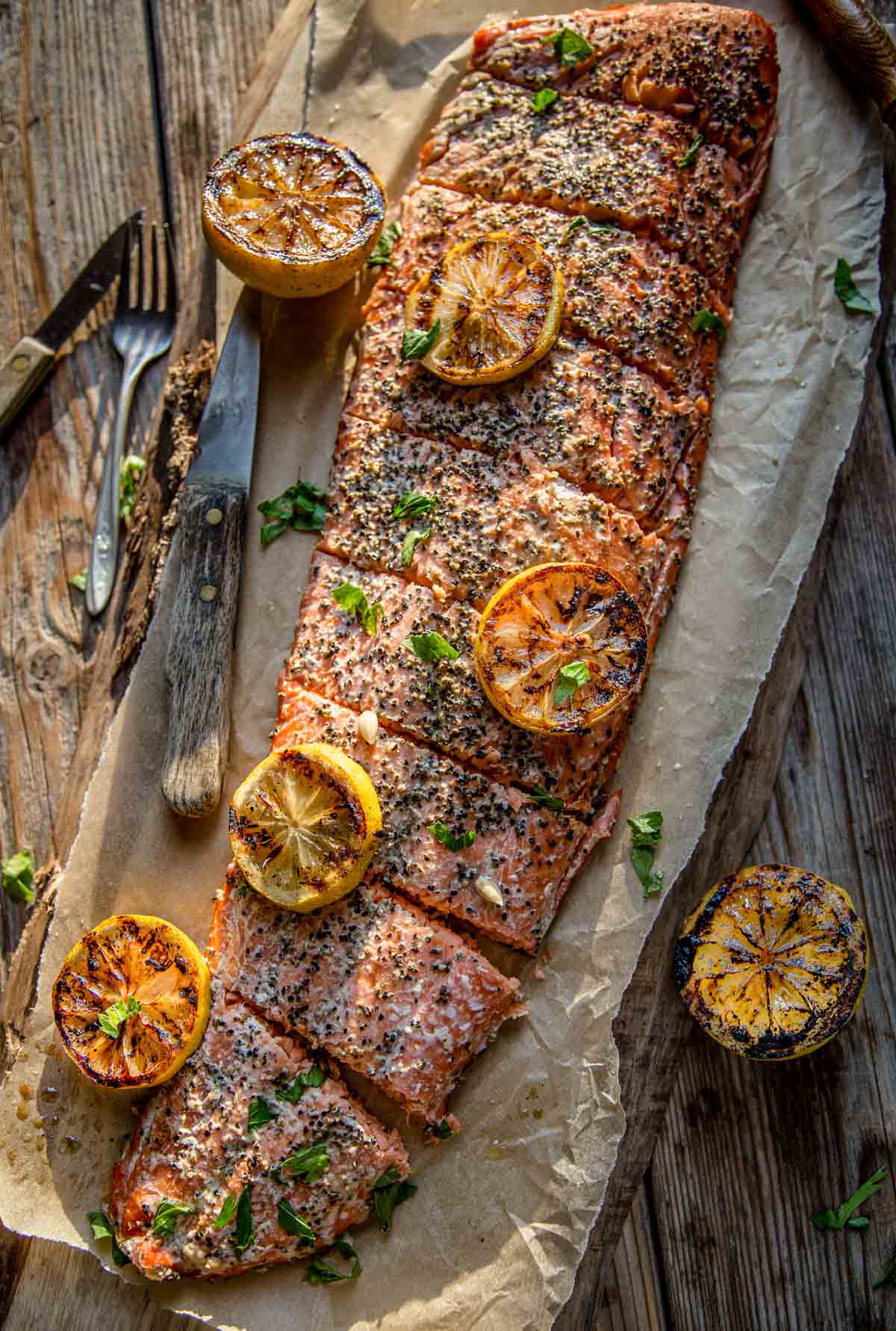 Smoked salmon on a cutting board.