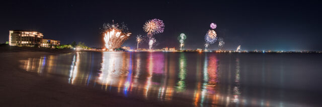 Fireworks at night over Grace Bay Beach and resorts