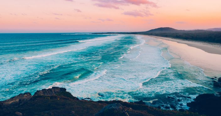 Spectacular sunset over the beach and ocean, creating a mesmerizing view in Tweed, NSW.