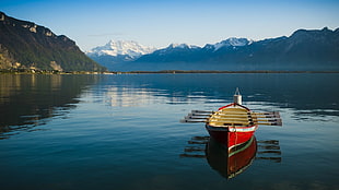 orange wooden canoe, boat, river