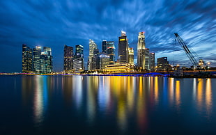 cityscape photo of high-rise buildings, cityscape, skyline, cranes (machine), skyscraper