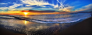 Body of Water Near Brown Soil Under Blue Sky during Sunset