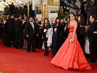 woman wearing pink tube trumpet dress on red carpet