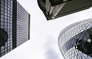 low angle photography of glass walled high-rise buildings during daytime