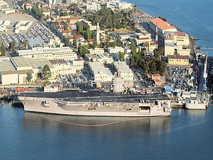 gray and black aircraft carrier, warship, aircraft carrier, cityscape, vehicle