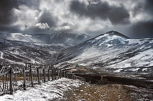 glacier mountain under grey clouds photo