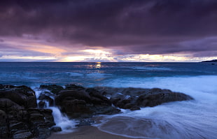 Sea Under Gray Sky during Day Time