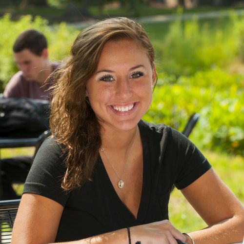 Female student closeup outside during summer S