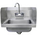 A stainless steel Advance Tabco hand sink with a faucet.