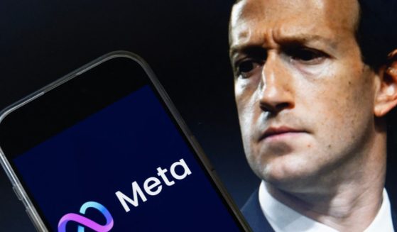 This compilation, created on Tuesday, shows an image of Mark Zuckerberg, CEO of Meta, and an image of the Meta logo.