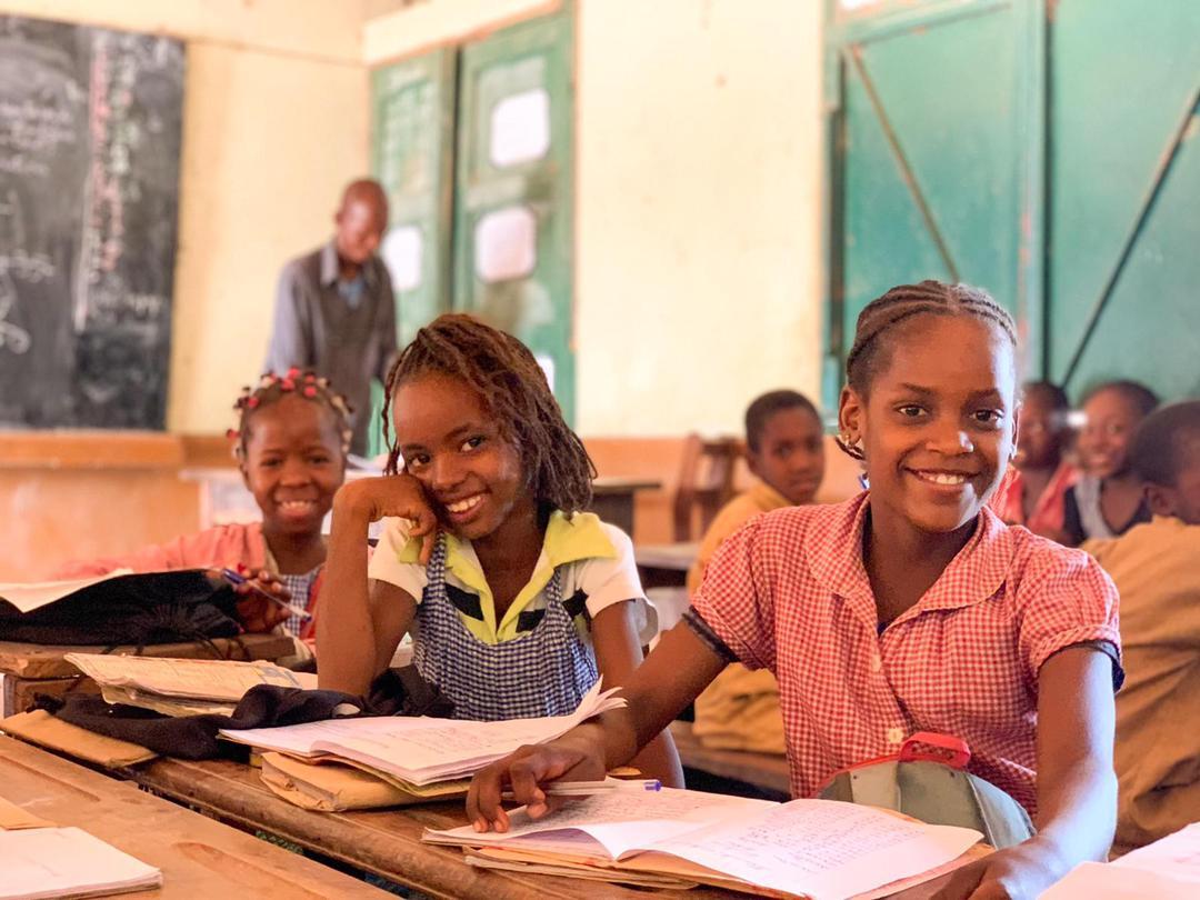 girls smiling in classroom