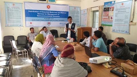 WHO Laboratory Expert Debashish Paul giving demonstration to the community health care providers on use of glucometer and urine strips supplied in Moheshkhali Upazila