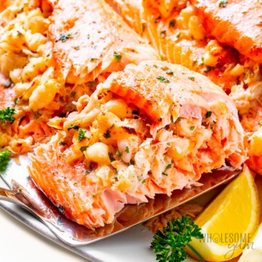 Crab stuffed salmon with spatula.