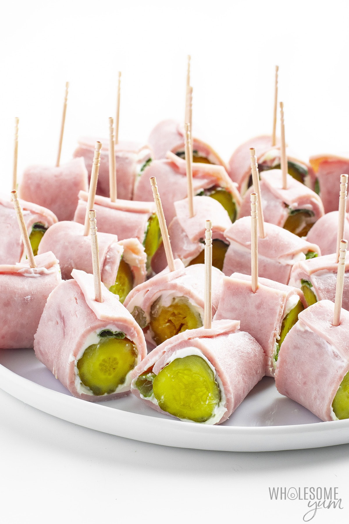 Big platter of ham cream cheese roll ups.