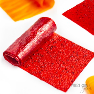 Homemade fruit leather recipe partially unrolled.