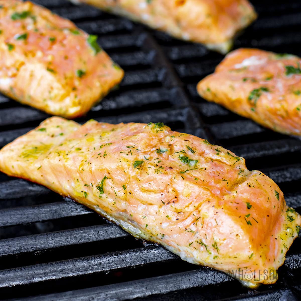 Salmon on the grill, skin side down.