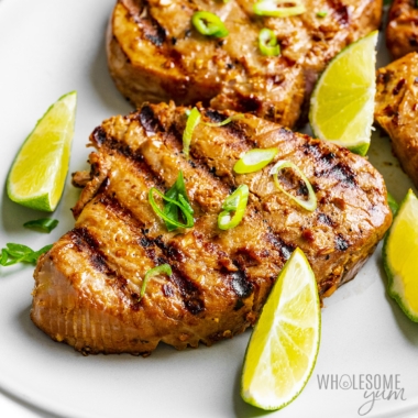 Grilled tuna steak on a plate.