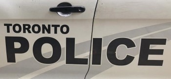 Toronto Police lettering is shown on the side of a police vehicle in Toronto on August 2, 2023. THE CANADIAN PRESS/Richard Buchan