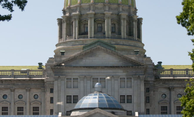 The Pennsylvania state capitol building and Soldier's Grove in Harrisburg on May 13, 2024. (Jeremy Long - WITF)