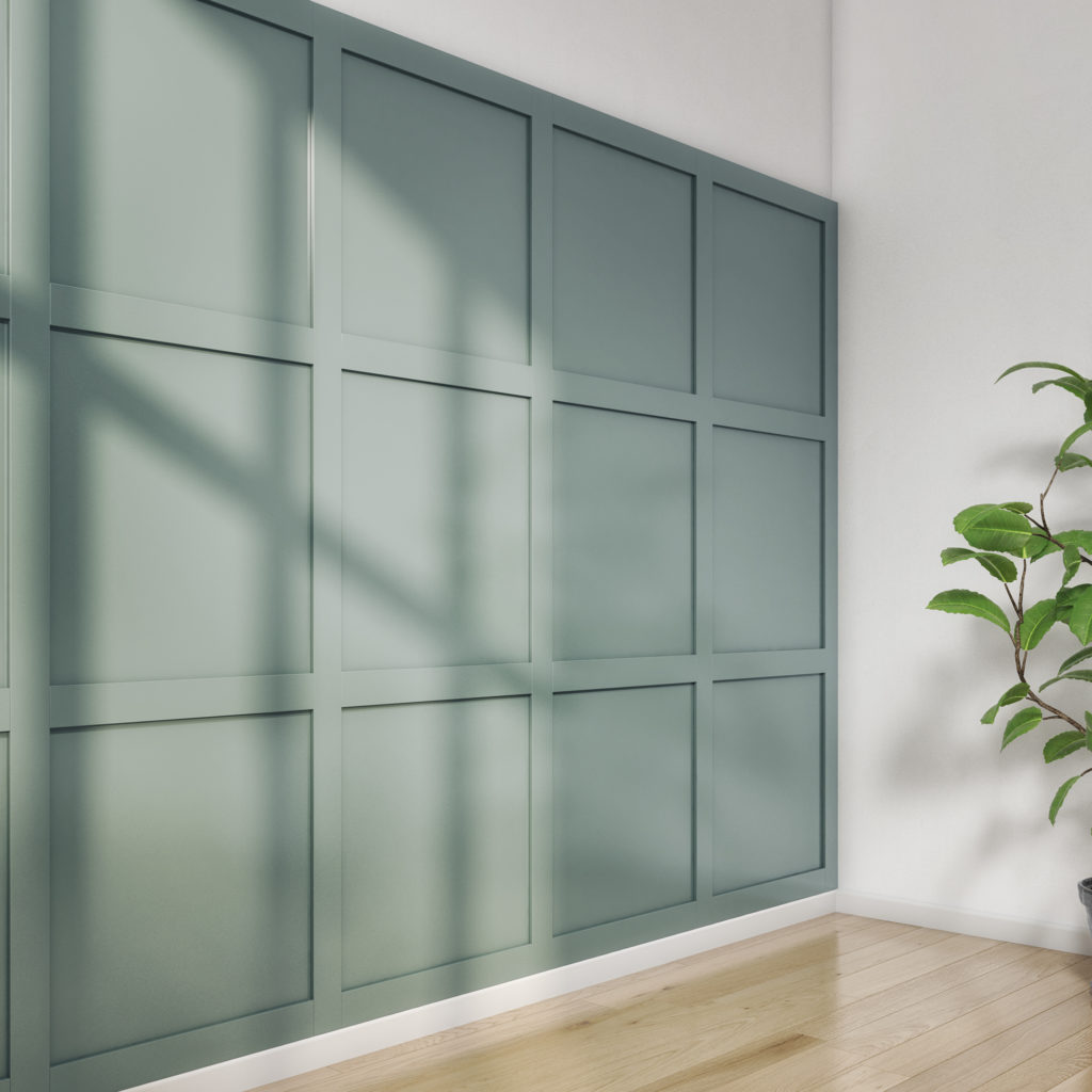 The shaker wall kit installed in a living room, painted a lovely lime green colour.