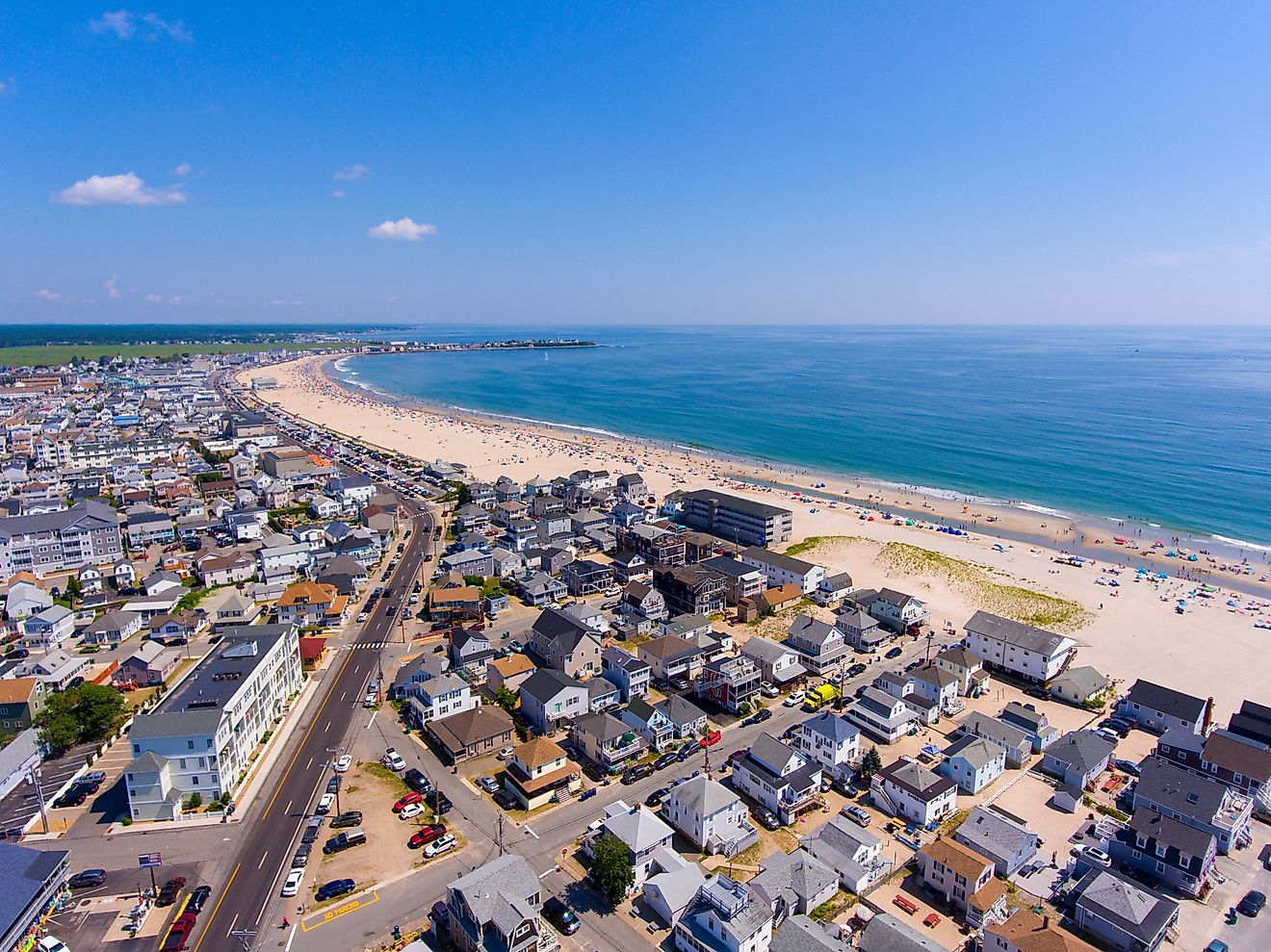 Hampton Beach aerial view including historic waterfront buildings on Ocean Boulevard and Hampton Beach State Park.